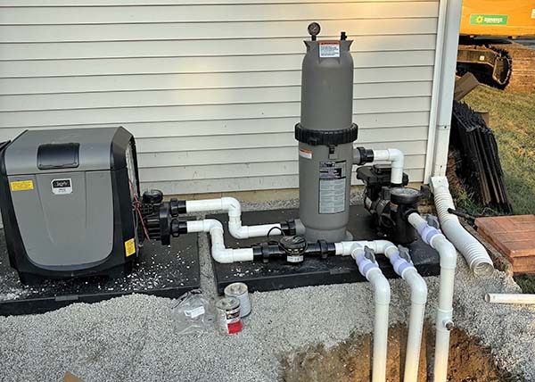 Gas pool heater being installed by Pool Brokers USA