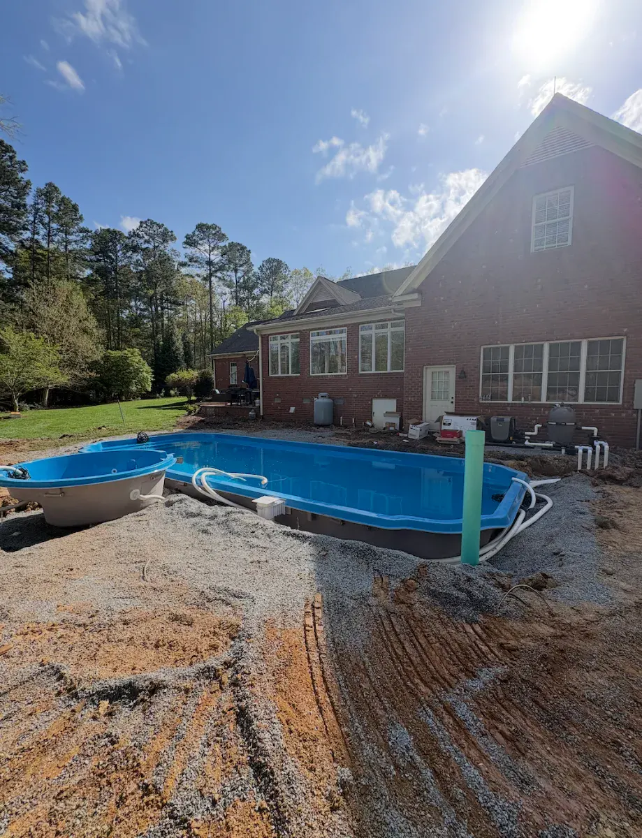 Featured image for “Why It Pays to Install Your Pool and Hot Tub at the Same Time”